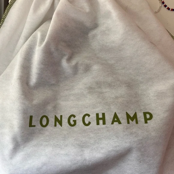 Longchamp Black Backpack with Gold Accents with dust bag - Picture 8 of 10